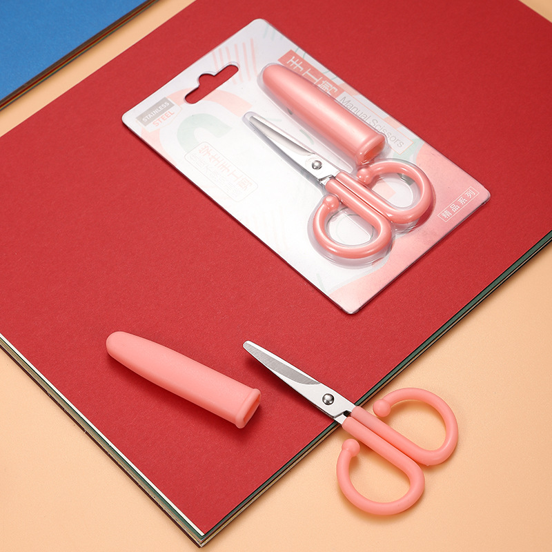 Small stainless steel scissors with protective cover for kids and home use